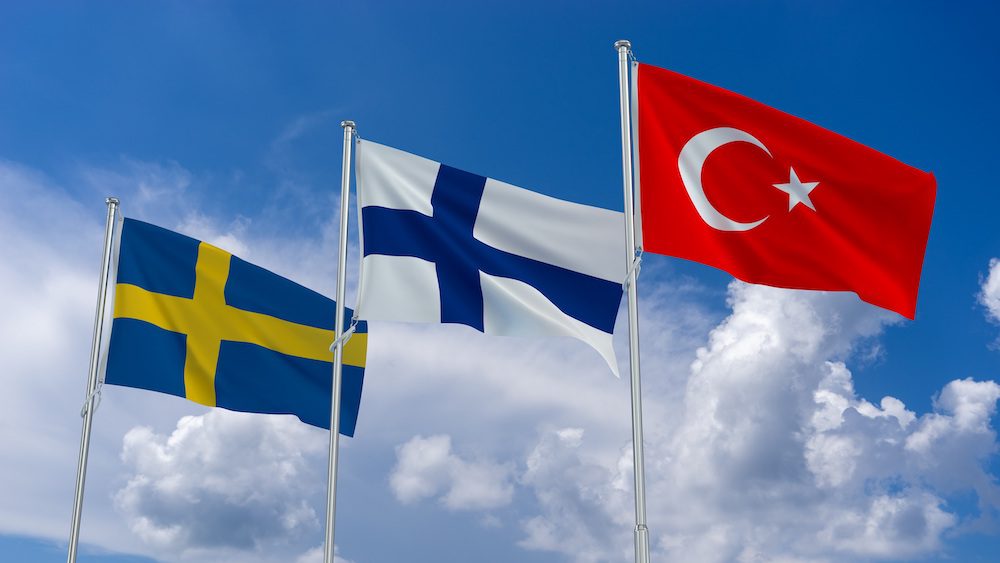 Flags of Sweden, Finland and Turkey Waving with Cloudy Blue Sky Background. 3d Rendering