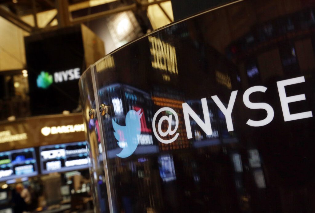 The Twitter bird logo is on an updated phone post on the floor of the New York Stock Exchange, Wednesday Nov. 6, 2013. Twitter's initial public offering was priced at $26 a share, Wednesday evening, and is expected to start trading on the New York Stock Exchange on Thursday. (AP Photo/Richard Drew)