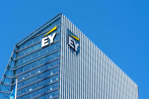 Toronto, Canada - May 5, 2019:  Sign and logo of EY on EY Tower in downtown Toronto. Ernst & Young is a multinational accounting firms headquartered in London, England.